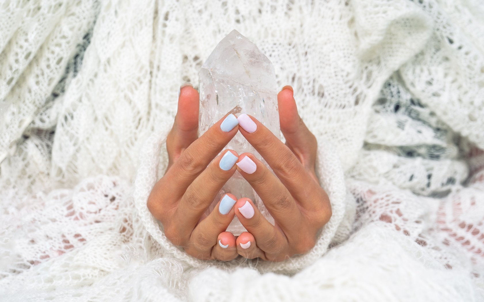 Woman's hands holding the natural protection crystal.